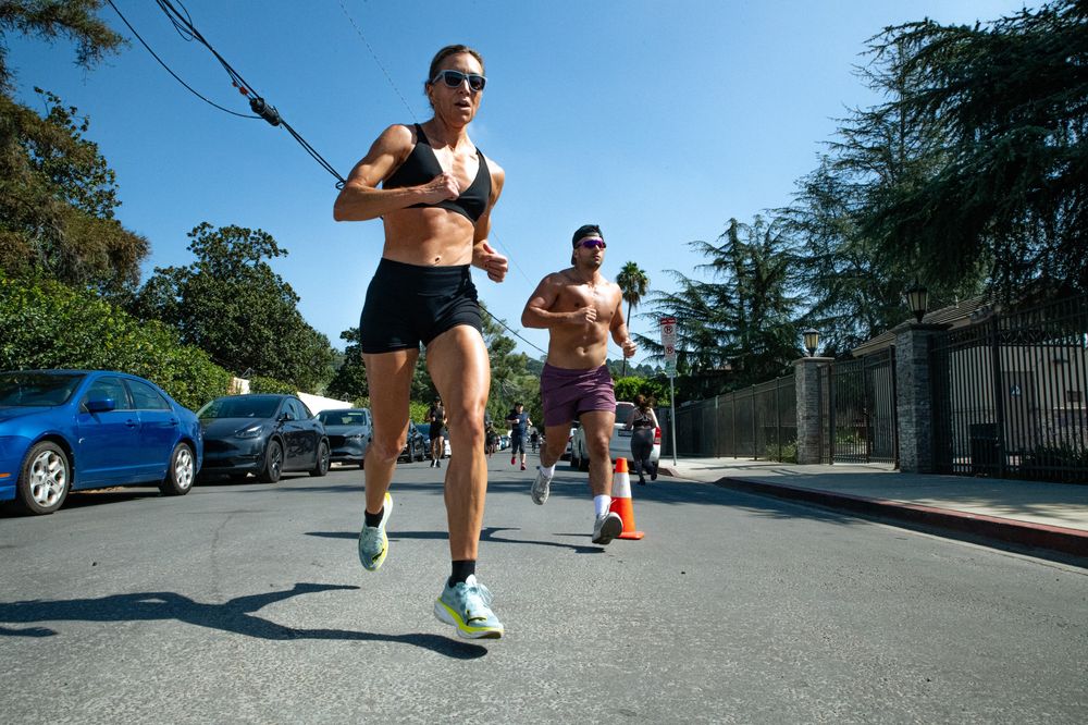 Athletes running outdoors during a long Engine+ session